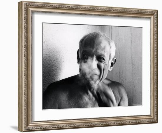 Portrait of Artist Pablo Picasso, Bare Chested and Smiling-Gjon Mili-Framed Premium Photographic Print
