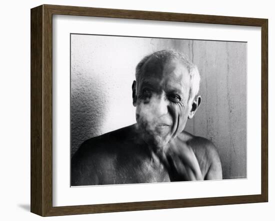 Portrait of Artist Pablo Picasso, Bare Chested and Smiling-Gjon Mili-Framed Premium Photographic Print