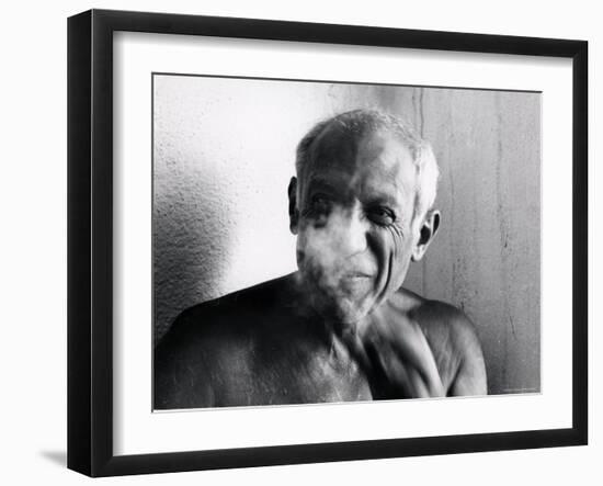 Portrait of Artist Pablo Picasso, Bare Chested and Smiling-Gjon Mili-Framed Premium Photographic Print