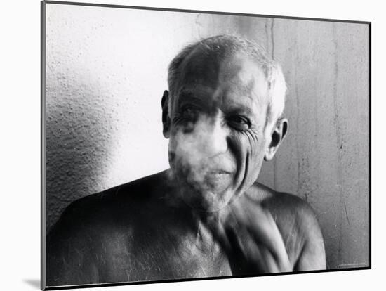 Portrait of Artist Pablo Picasso, Bare Chested and Smiling-Gjon Mili-Mounted Premium Photographic Print
