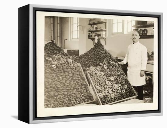 Portrait of Chef Leoni with Bins of Doughnuts for the Salvation Army at the Hotel Commodore, 1919-Byron Company-Framed Premier Image Canvas