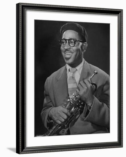 Portrait of Dizzy Gillespie, "Bebop" King, Holding His Trumpet-Allan Grant-Framed Premium Photographic Print