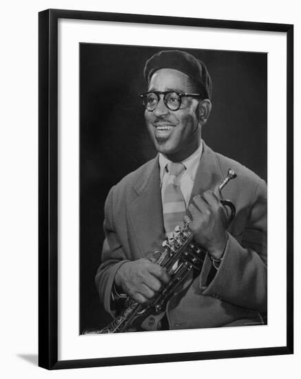 Portrait of Dizzy Gillespie, "Bebop" King, Holding His Trumpet-Allan Grant-Framed Premium Photographic Print