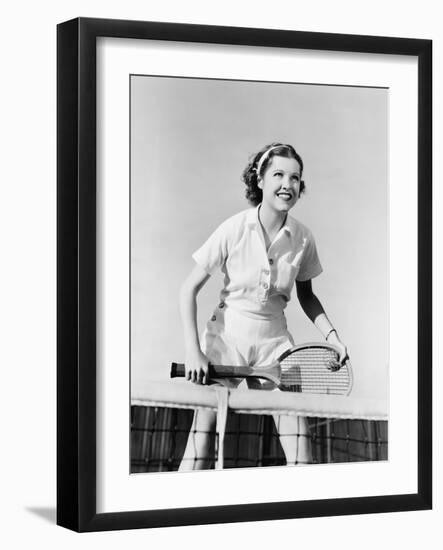 Portrait of Female Tennis Player at the Net-null-Framed Photo