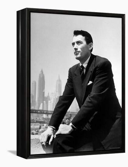 Portrait of Gregory Peck, Serious, Smoking a Cigarette-Nina Leen-Framed Premier Image Canvas