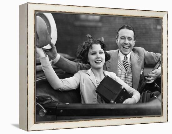 Portrait of Happy Couple Waving in Car-null-Framed Stretched Canvas