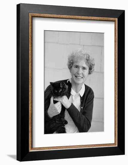 Portrait of Life Photographer Margaret Bourke-White Holding Her Black Cat, 1961-Alfred Eisenstaedt-Framed Photographic Print