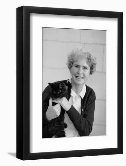 Portrait of Life Photographer Margaret Bourke-White Holding Her Black Cat, 1961-Alfred Eisenstaedt-Framed Photographic Print