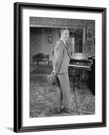 Portrait of Man in Suit Holding Hat-null-Framed Photo