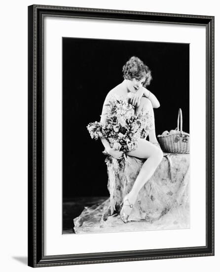 Portrait of Nude Woman Holding Flowers-null-Framed Photo