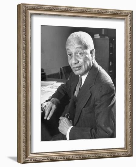 Portrait of Philosopher Alain Leroy Locke Sitting at Desk in Office at Howard University-Alfred Eisenstaedt-Framed Photographic Print