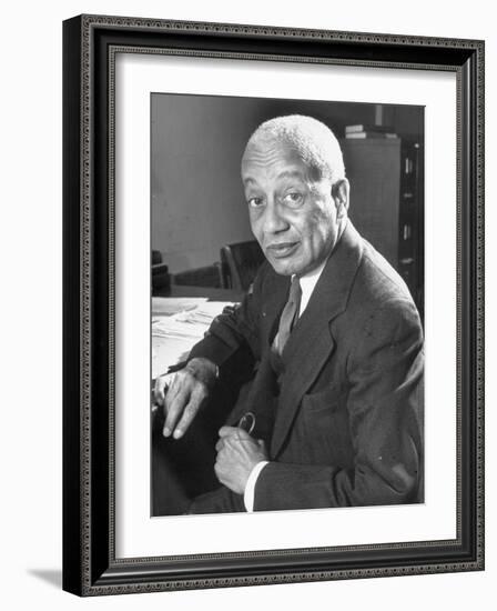 Portrait of Philosopher Alain Leroy Locke Sitting at Desk in Office at Howard University-Alfred Eisenstaedt-Framed Photographic Print
