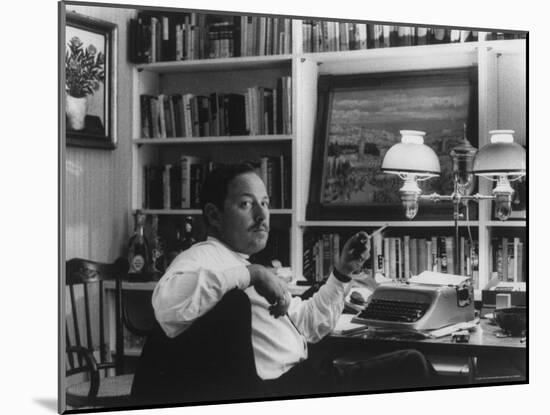 Portrait of Playwright Tennessee Williams Sitting at His Typewriter-Alfred Eisenstaedt-Mounted Premium Photographic Print