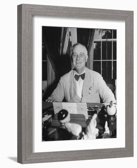 Portrait of President Franklin Roosevelt Alone, Smiling, at Desk in White House-George Skadding-Framed Photographic Print