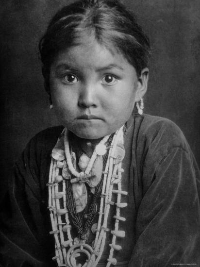 Portrait Of Small Girl In Costume Who Is Native American Navajo