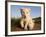 Portrait of Two White Lion Cub Siblings, One Laying Down and One with it's Paw Raised.-Karine Aigner-Framed Photographic Print