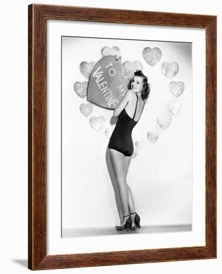 Portrait of Woman Holding Large Valentine-null-Framed Photo