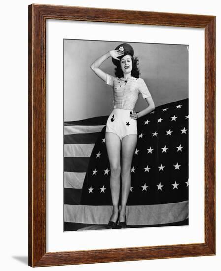 Portrait of Woman Saluting with American Flag-null-Framed Photo