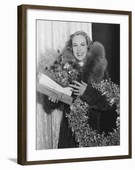 Portrait of Woman with Christmas Wreath and Gifts-null-Framed Photo
