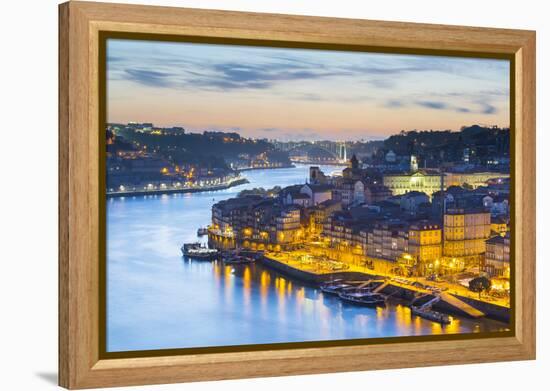 Portugal, Douro Litoral, Porto. Dusk in the UNESCO listed Ribeira district, viewed from Dom Luis I -Nick Ledger-Framed Premier Image Canvas