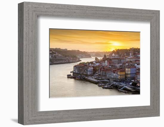 Portugal, Douro Litoral, Porto. Sunset over the UNESCO listed Ribeira district, viewed from Dom Lui-Nick Ledger-Framed Photographic Print