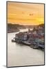 Portugal, Douro Litoral, Porto. Sunset over the UNESCO listed Ribeira district, viewed from Dom Lui-Nick Ledger-Mounted Photographic Print