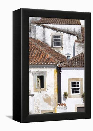 Portugal, Obidos. Ancient, red, terra cotta tiled roof tops, lines.-Emily Wilson-Framed Premier Image Canvas