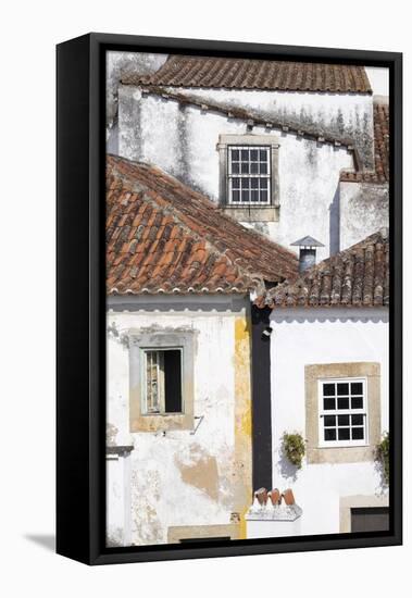 Portugal, Obidos. Ancient, red, terra cotta tiled roof tops, lines.-Emily Wilson-Framed Premier Image Canvas