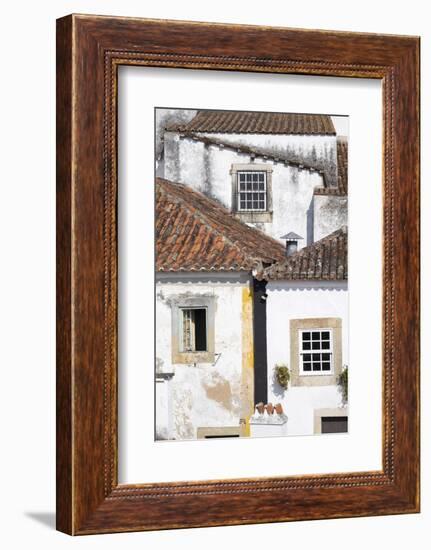 Portugal, Obidos. Ancient, red, terra cotta tiled roof tops, lines.-Emily Wilson-Framed Photographic Print