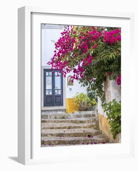 Portugal, Obidos. Beautiful bougainvillea blooming in the town of Obidos, Portugal.-Julie Eggers-Framed Photographic Print