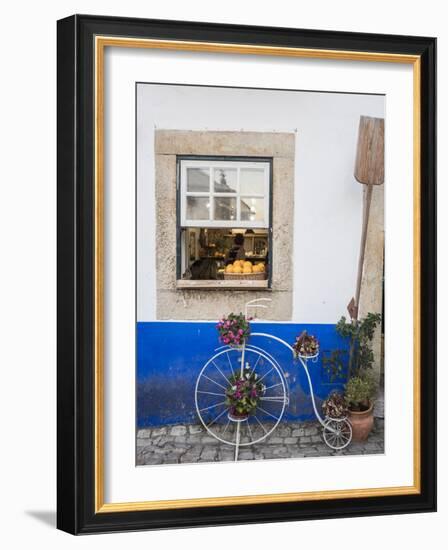 Portugal, Obidos. Cute bicycle planter in front of a bakery in the walled city of Obidos.-Julie Eggers-Framed Photographic Print