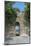 Portugal, Obidos, View of Farm Through Battlement Opening in Courtyard-Lisa S. Engelbrecht-Mounted Photographic Print