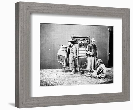 Posed Portrait of a Street Food Seller, C.1875-William Saunders-Framed Photographic Print