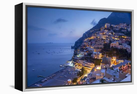 Positano and beach at dusk, Amalfi Coast (Costiera Amalfitana), UNESCO World Heritage Site, Campani-John Miller-Framed Premier Image Canvas