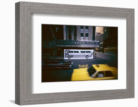 Poster of a Greyhound Bus in Front of Radio City Music Hall, New York, New York, Summer 1967-Yale Joel-Framed Photographic Print