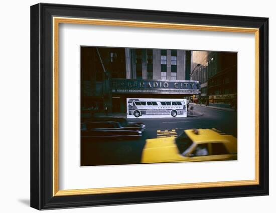 Poster of a Greyhound Bus in Front of Radio City Music Hall, New York, New York, Summer 1967-Yale Joel-Framed Photographic Print