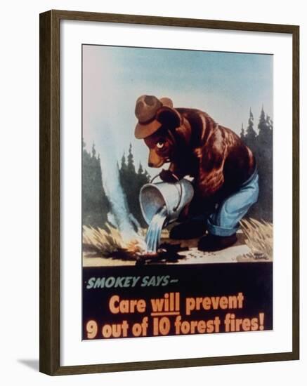 Poster of Smokey the Bear Putting Out a Forest Fire, "Care Will Prevent 9 Out of 10 Forest Fires!"--Framed Premium Photographic Print