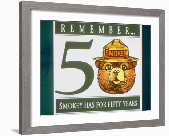 Poster of Smokey the Bear with Caption Reading Remember - 50 - Smokey Has for Fifty Years-null-Framed Premium Photographic Print