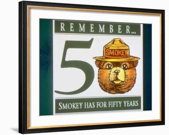 Poster of Smokey the Bear with Caption Reading Remember - 50 - Smokey Has for Fifty Years-null-Framed Premium Photographic Print