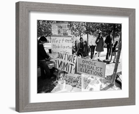 Posters and Anti-Voting Literature on Outdoor Table During a Yippie Led Anti-Election Protest-Ralph Crane-Framed Photographic Print