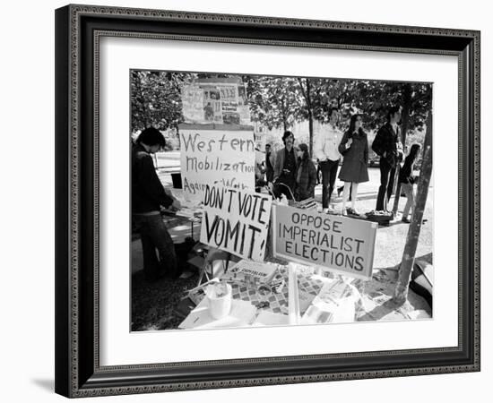 Posters and Anti-Voting Literature on Outdoor Table During a Yippie Led Anti-Election Protest-Ralph Crane-Framed Photographic Print