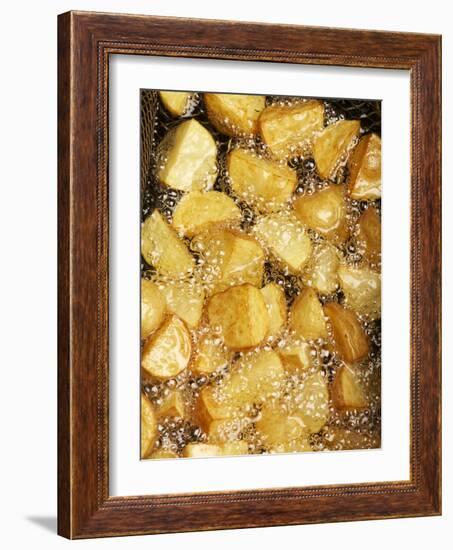 Potatoes Being Fried in Hot Oil-Enrique Chavarria-Framed Photographic Print