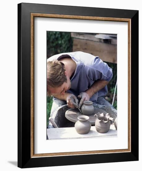 Potter at Work on Wheel at Rustic Fayre, Devon, England, United Kingdom-Ian Griffiths-Framed Photographic Print