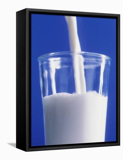 Pouring a Glass of Milk-Ulrike Koeb-Framed Premier Image Canvas