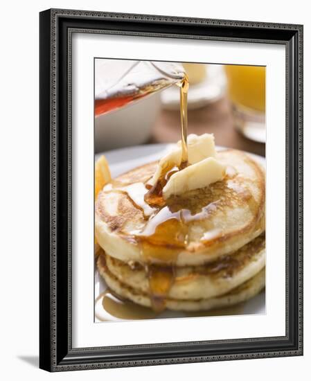 Pouring Maple Syrup over Pancakes with Dab of Butter-null-Framed Photographic Print