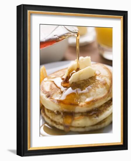 Pouring Maple Syrup over Pancakes with Dab of Butter-null-Framed Photographic Print