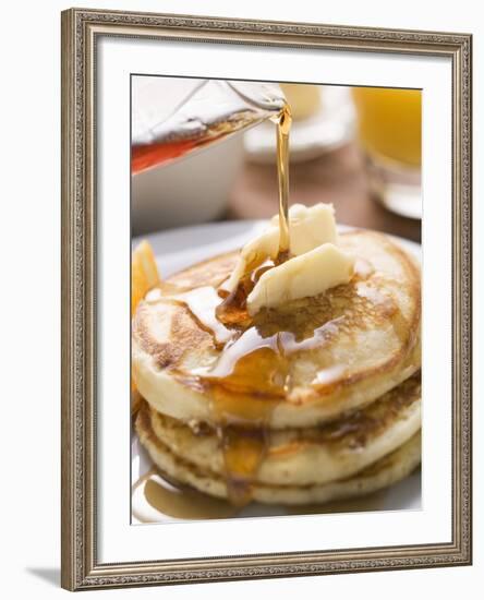 Pouring Maple Syrup over Pancakes with Dab of Butter-null-Framed Photographic Print