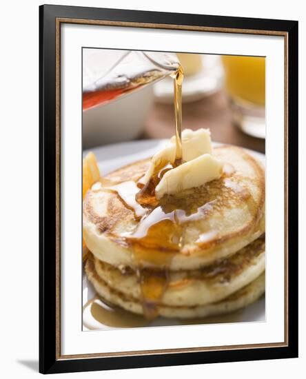 Pouring Maple Syrup over Pancakes with Dab of Butter-null-Framed Photographic Print