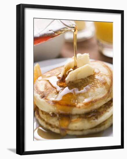 Pouring Maple Syrup over Pancakes with Dab of Butter-null-Framed Photographic Print