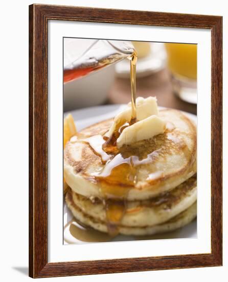 Pouring Maple Syrup over Pancakes with Dab of Butter-null-Framed Photographic Print